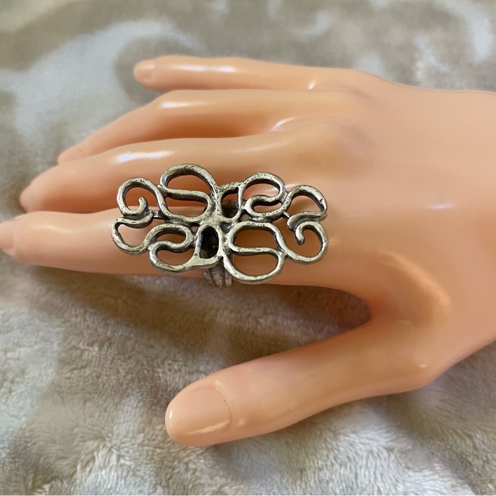 Statement distressed adjustable all silver ring. EUC .